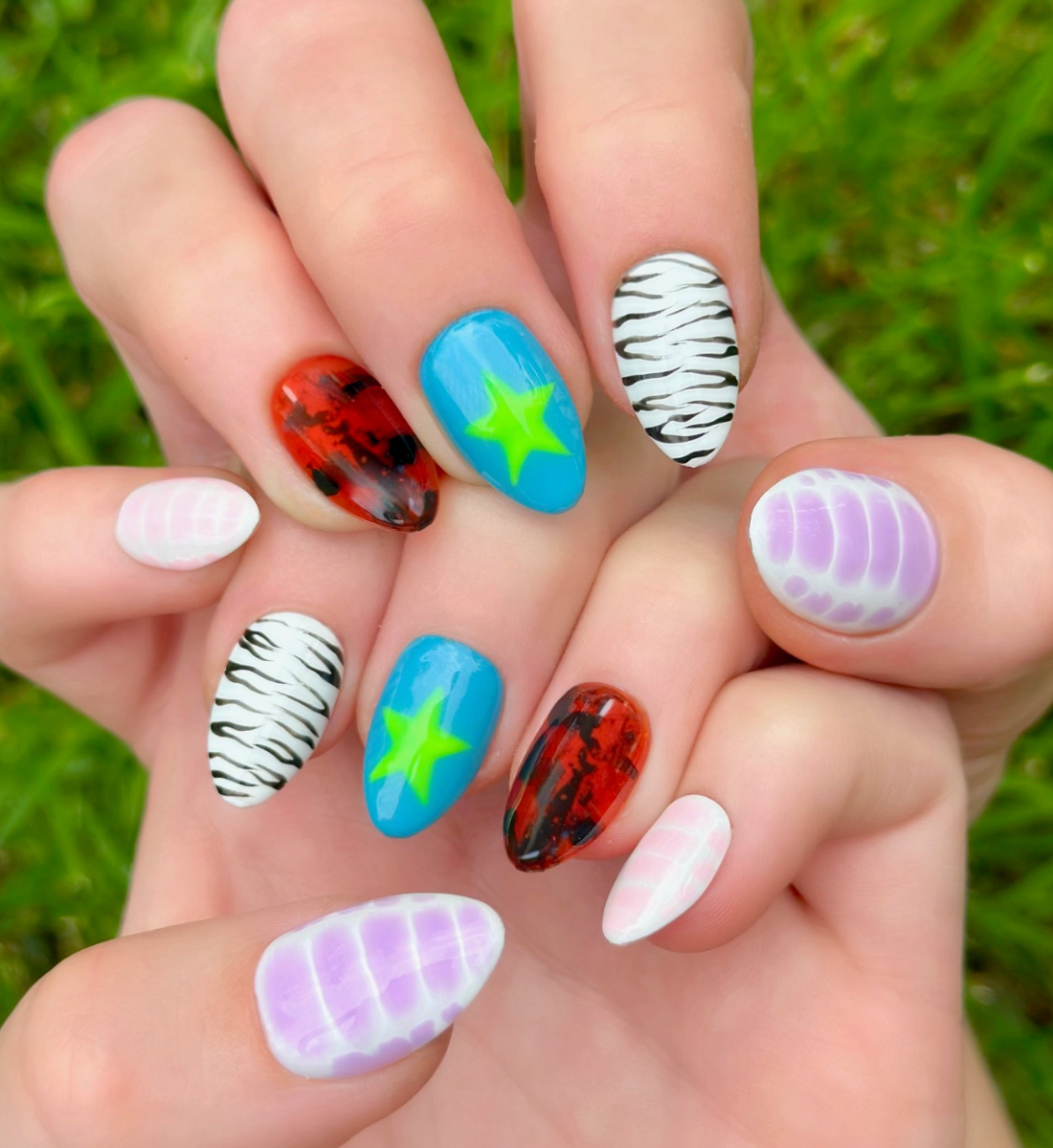 Savage: 24pc Short Almond Hand-Painted Luxury Press-on Nails