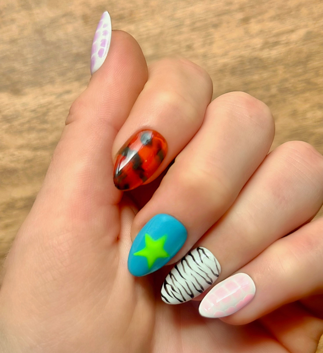 Savage: 24pc Short Almond Hand-Painted Luxury Press-on Nails